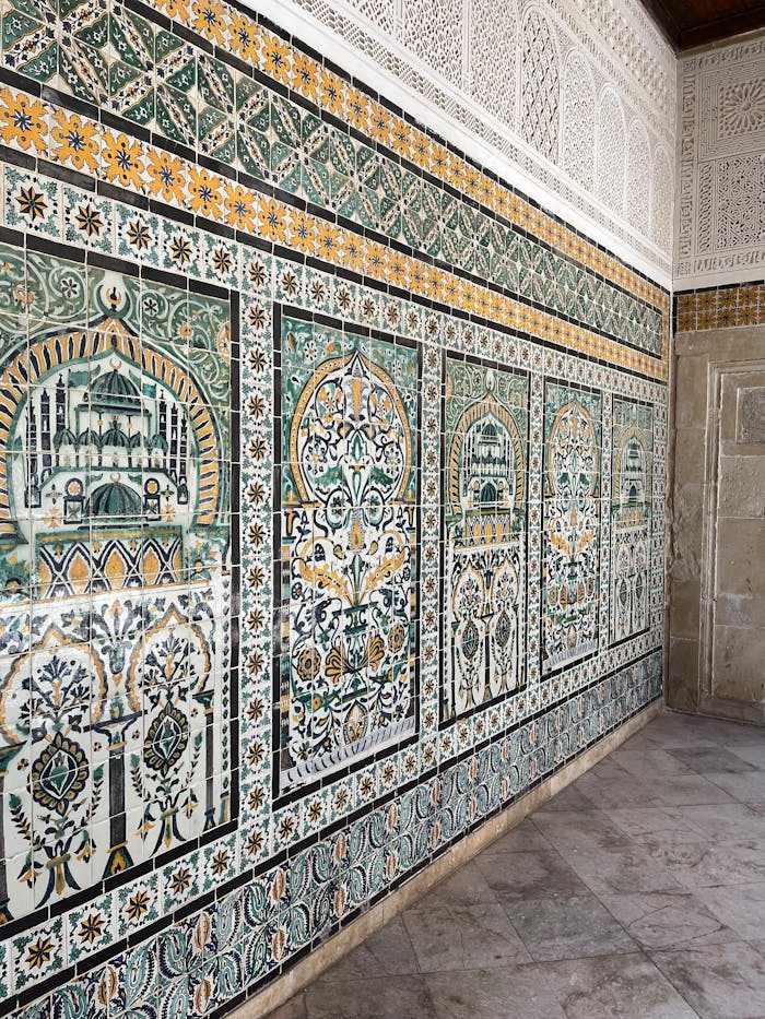 Detailed traditional Tunisian tiles showcasing ornate Islamic patterns and cultural artistry in vibrant colors.